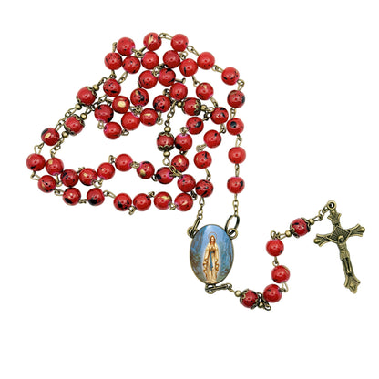 Our Lady of Lourdes Virgen de Lourdes Red Round Beads Rosary with Bronze findings and crucifix Bezel centerpiece with color image Includes prayer card Imported from Italy